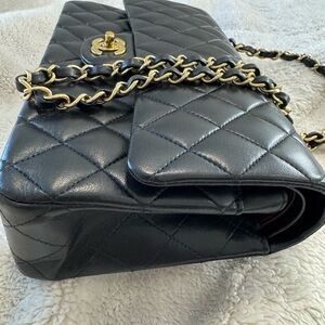 CHANEL Black Quilted Leather Bag with Gold Chain